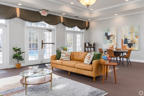 a living room with a couch and a table